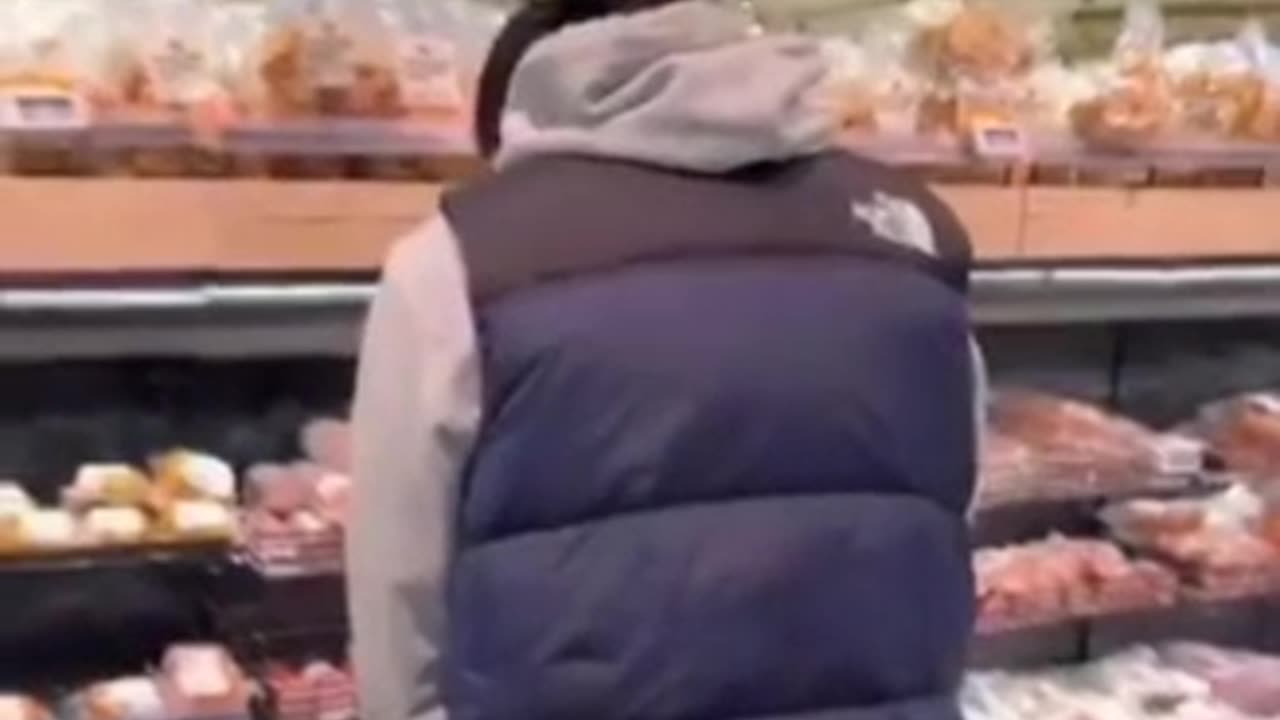 Holland - Muslim urinating on the pork section at a supermarket