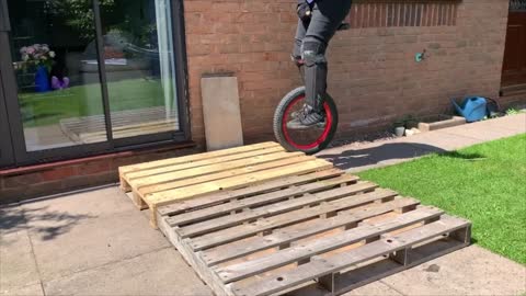 Trials Unicyclist Fails Pallet Hop Then Bangs His Head