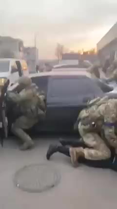 Ukraine soldiers beating civilians