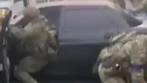 Ukraine soldiers beating civilians