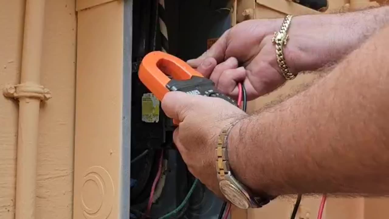 Replacing 100 amp main breaker and removing wire on illegal generator back-feed outlet.