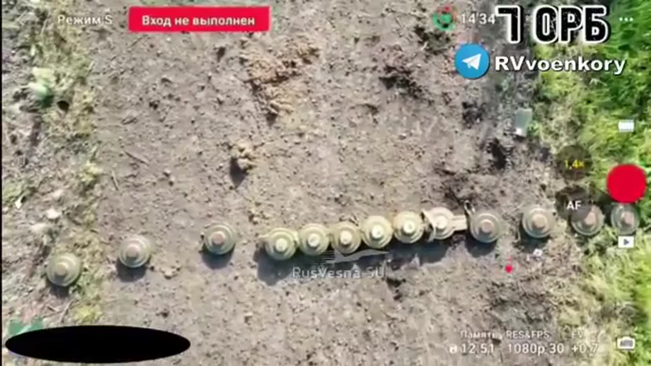 Russian drone operators explode a line of Ukrainian anti-tank mines, drone gets hit by the explosion