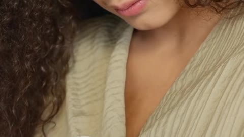 Close-up Video of a person holding a dove, showcasing the spirit of peace.