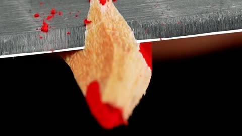 Pencil sharpening in slow motion close-up, satisfying