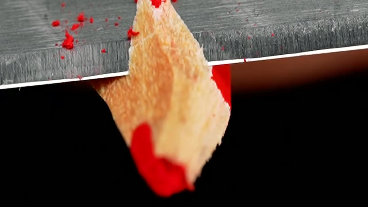 Pencil sharpening in slow motion close-up, satisfying