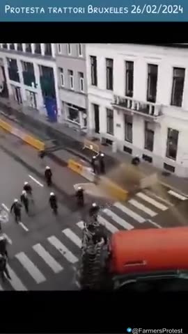 Belgian farmers spray police with wastewater