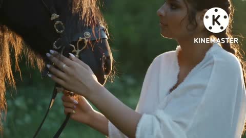 Horse along beautiful lady