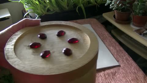 Unique DIY Project: Refurbishing a Wooden Box with Metallic Gold Paint and Red Glass Decorations