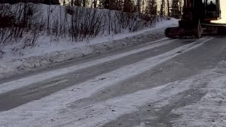 Sliding a Backhoe Down an Icy Road