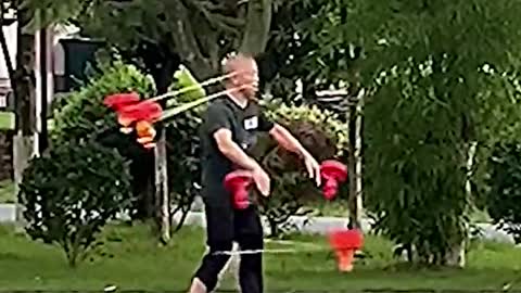 Elderly Chinese man spins 6 diabolos at once #shorts