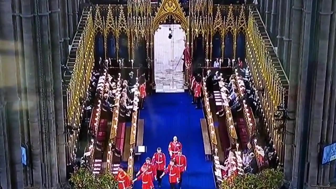 WATCH: The Grim Reaper walks by as Charles is crowned the new King. via #ToreSays