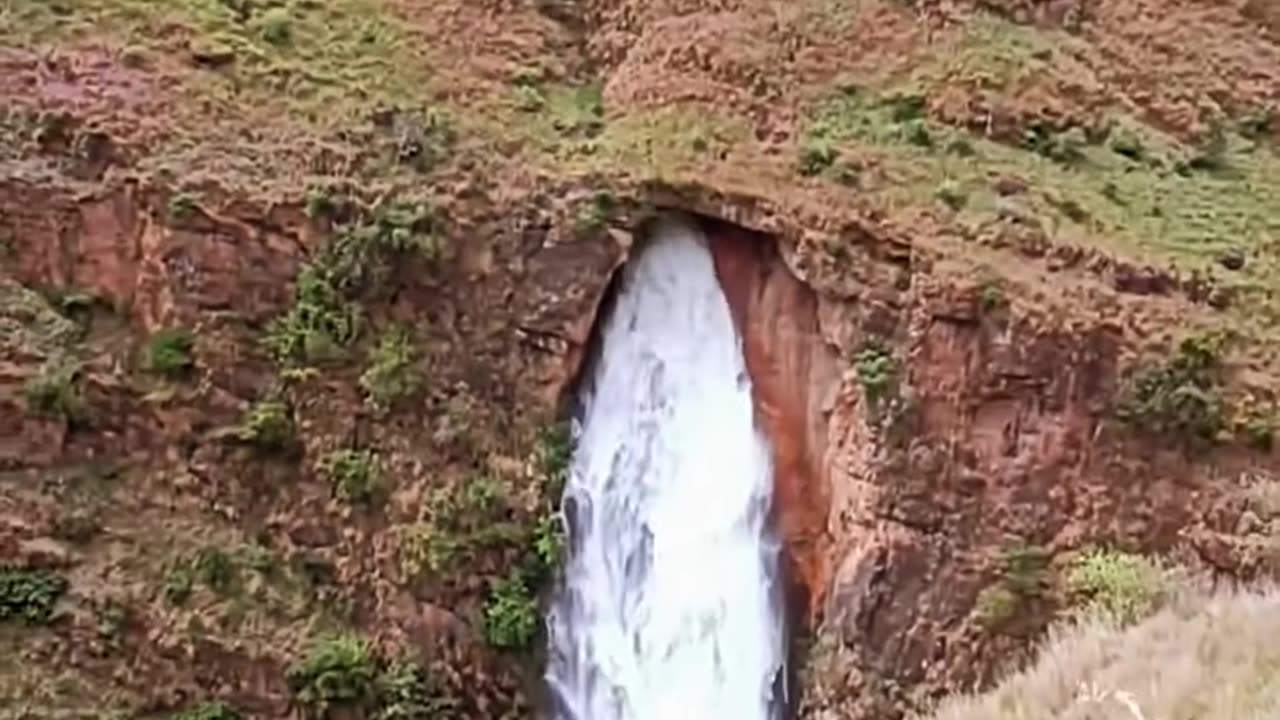 An incredibly beautiful spring coming out of the chest of the mountain.