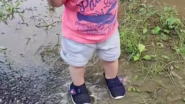 Perfect Puddle Soaks Playful Kid