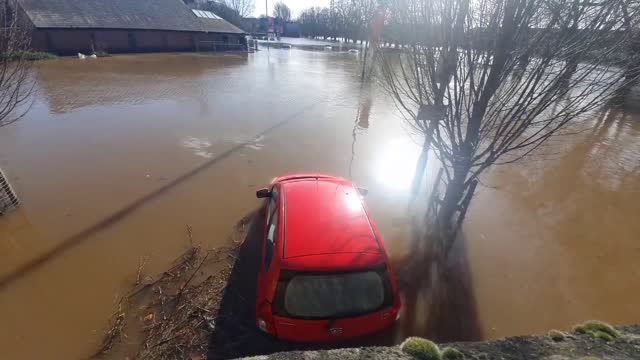 Cars are stranded in York after River Ouse overtopped its banks- NEWS OF WORLD