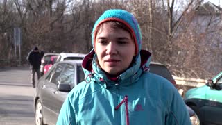 Fleeing war, people cross into Romania from Ukraine