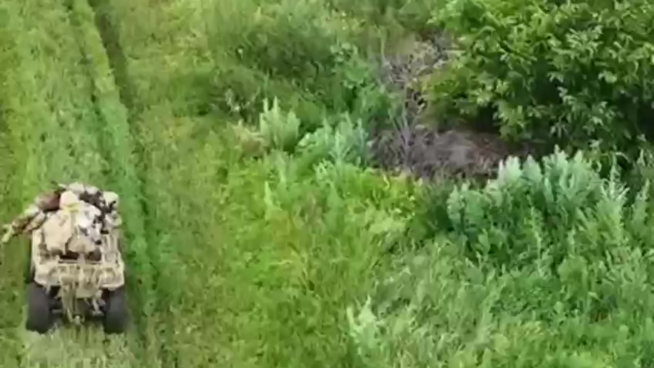 Evacuation of a wounded soldier from the battlefield on an ATV