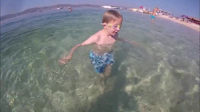 Kids Explore Sea While Swimming Underwater