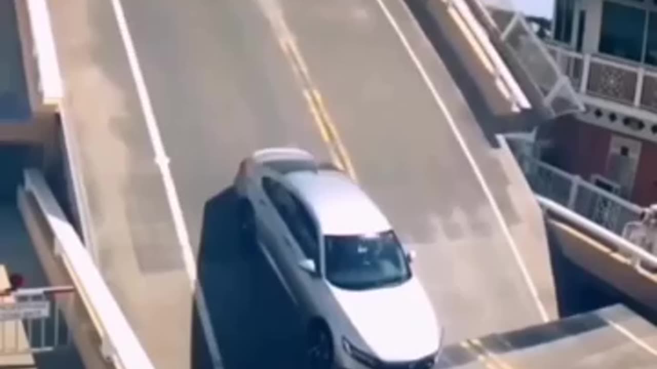 man almost dies as bridge is closing in on his car (MUST WATCH!)