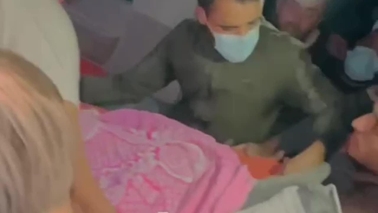 The moment a young man was pulled alive from under the rubble from a