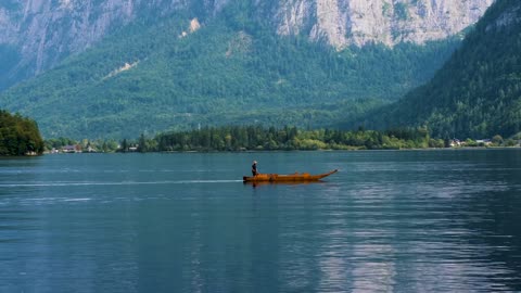 boat man fishing and riding on water e