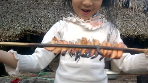 The baby came home with her father and enjoyed grilled shrimp