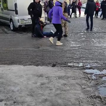 Ukrainian militants dragging men off the streets and sending them to the front
