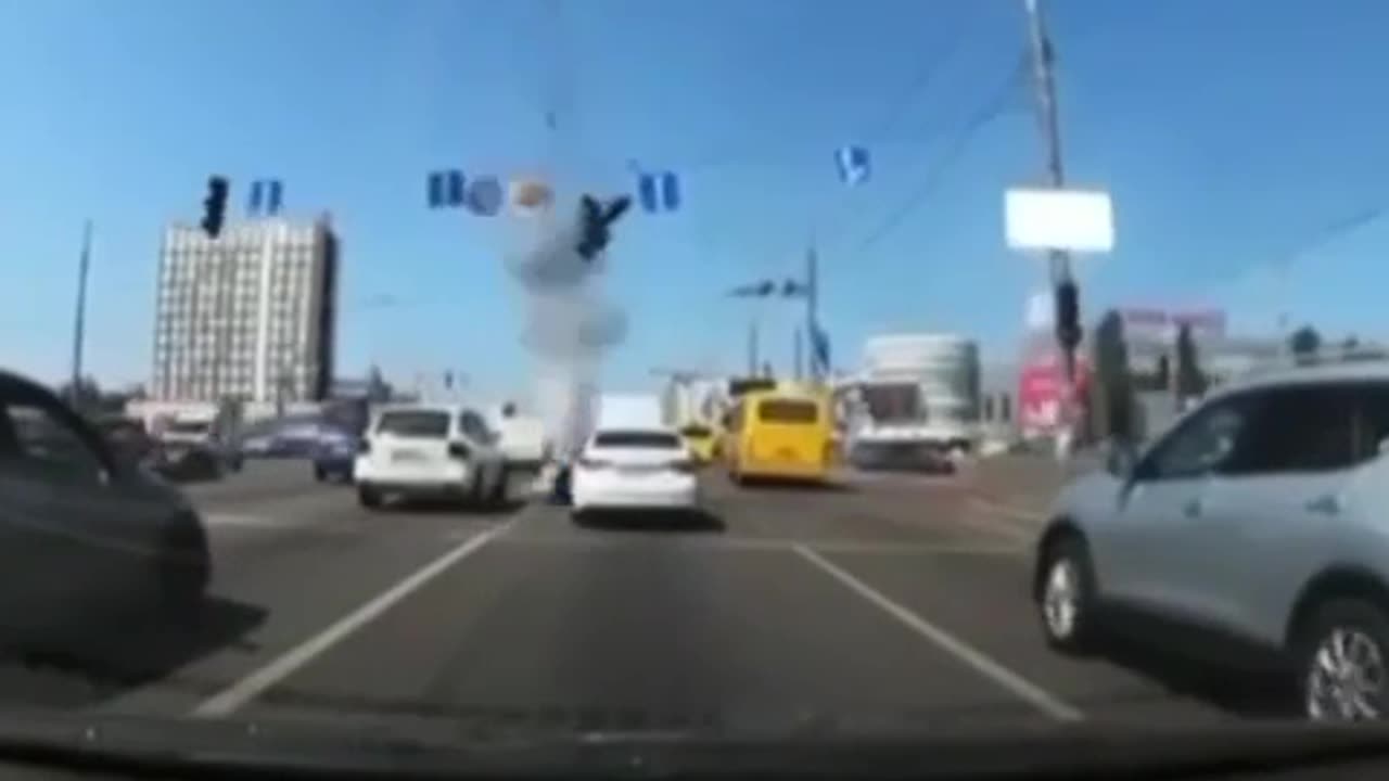 Another video of a russian rocket fragment falling in Kyiv. Miraculously no one got hurt