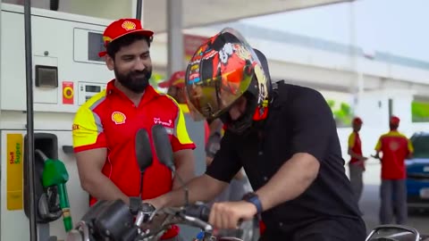 Biker's type at petrol pump