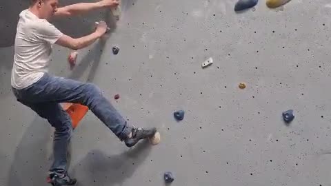 Boulderer Slips On A Difficult Climb