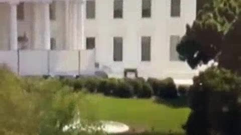 2 Men Carrying What Looks Like a Casket Into The WhiteHouse?