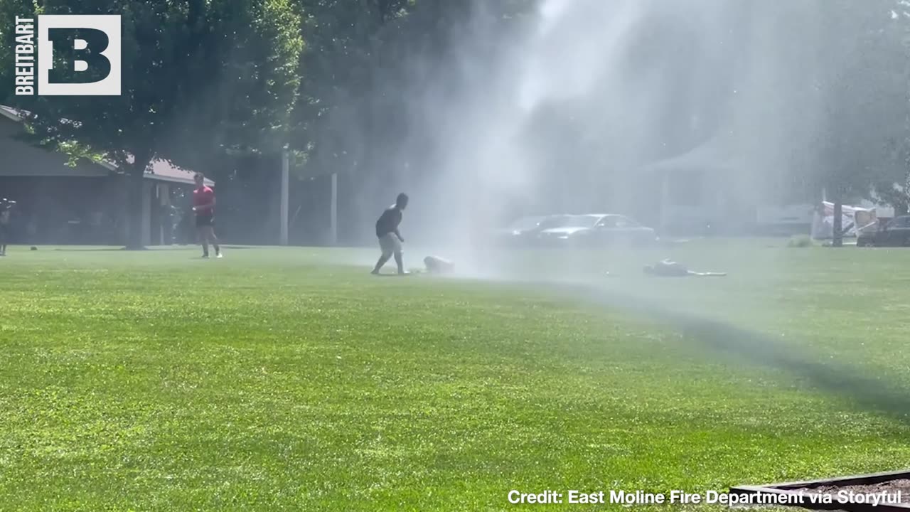 THAT'S A BIG WATER GUN! Firefighters Help Local Kids Beat the Heat in Illinois