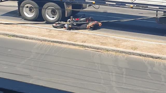 Motorcyclist Meets the Median after Semi-Truck Accident