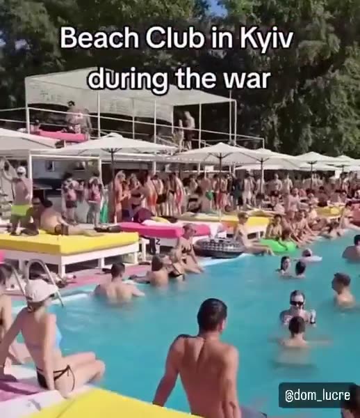 Day or night in Kiev the party goes on while other unlucky men are on the front lines