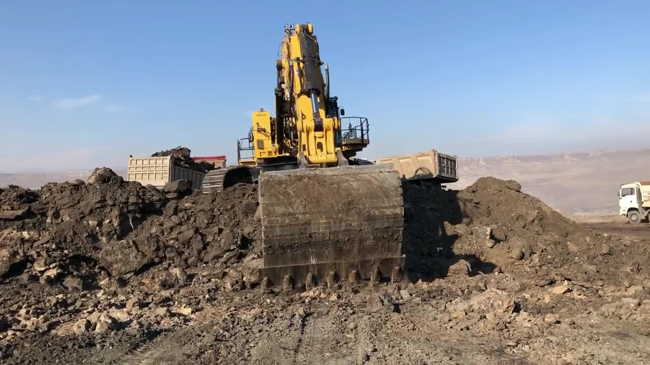 Caterpillar 6015B Excavator Loading Trucks With Two Passes - Sotiriadis Mining Works