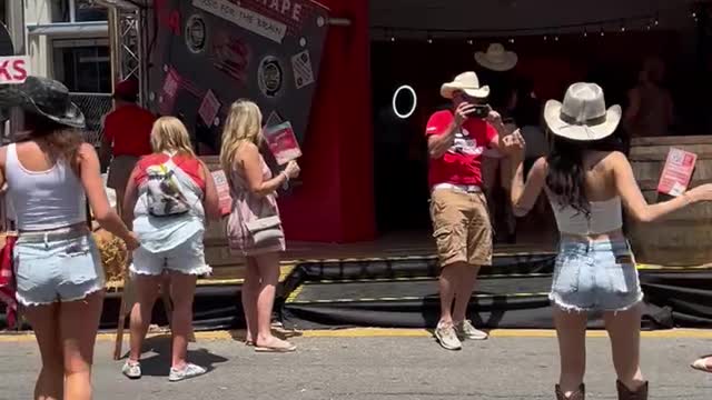 Dancers at AARP booth during CMA Fan Fest 2022, Nashville, Tennessee