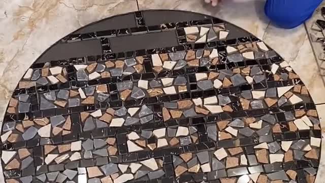Young Man with great tiling skills -Great tiling skills -Great technique in construction