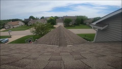 Guy Shot Basketball Over The House Roof And Scores