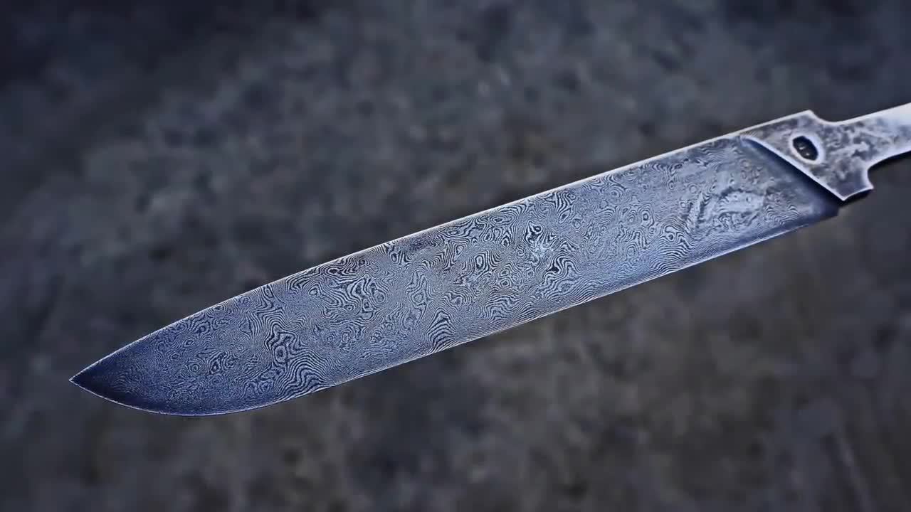 Damascus steel from two tape measures and 100 blades of stationery knives