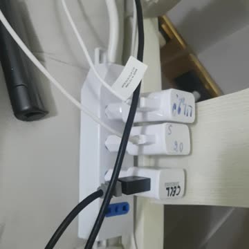 three chargers plugged in