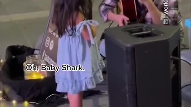 Orchard busker fulfills toddler's 'Baby Shark" song request