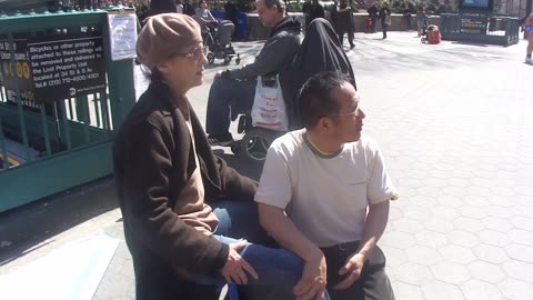 Luodong Massages Elderly Woman On Street