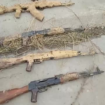 About 20 boxes of ammunition and several dozen machine guns were found