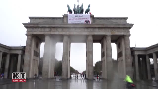 Climate Activists Protest on Berlin’s Brandenburg Gate