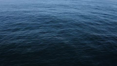 Aerial shot of calm blue sea