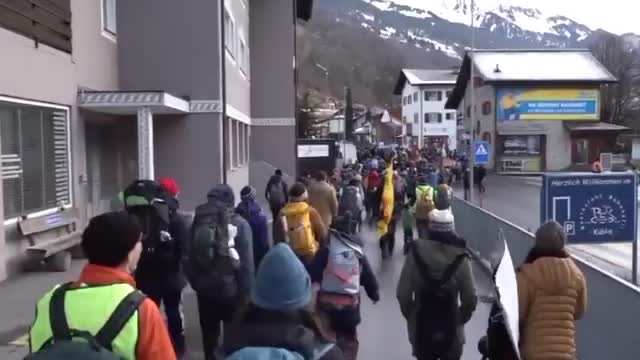 ‘Tax the rich’: Protesters march in Davos ahead of World Economic Forum