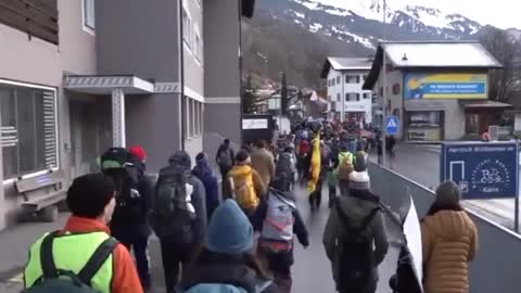 ‘Tax the rich’: Protesters march in Davos ahead of World Economic Forum