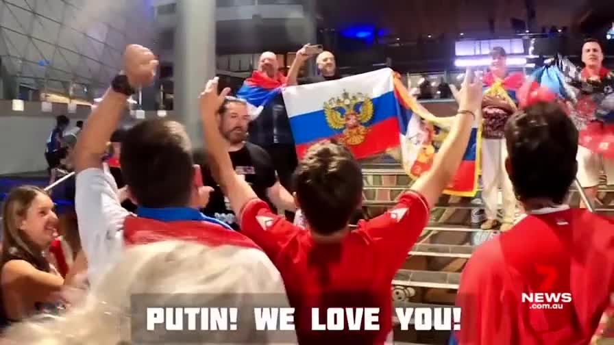 Father Of Tennis Star Is Under Fire For Posing With Pro-Russian Fans At The Australian Open