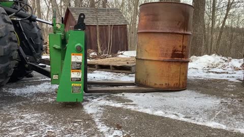 Loading oil drums