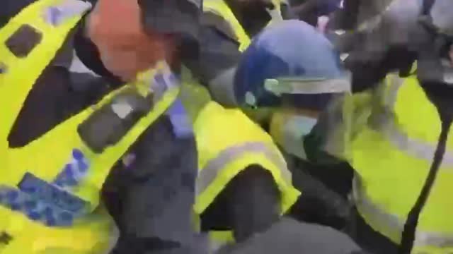 Manchester, United Kingdom protesters class with police
