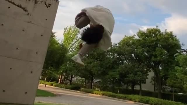 He is trying to learn good Parkour skills